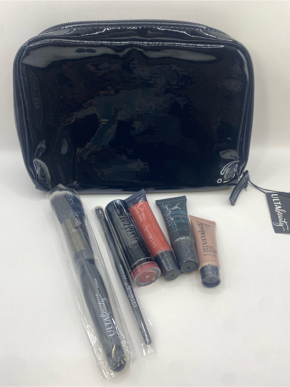 ULTA Beauty 7-Piece Makeup Lot Set w/ Cosmetic Bag Brushes Lipstick Primers